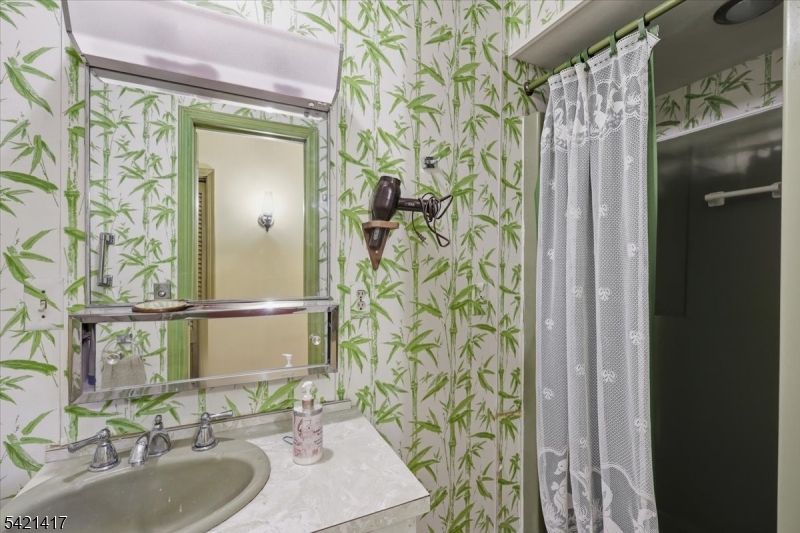100 Old Croton Road Flemington, NJ 08822 - Photo 19 of 39 a bathroom with a sink and a mirror