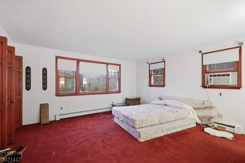 100 Old Croton Road Flemington, NJ 08822 - Photo 20 of 39 a bedroom with a large bed and a large window