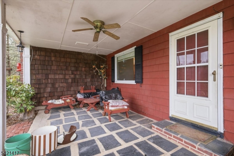 100 Old Croton Road Flemington, NJ 08822 - Photo 23 of 39 a view of a patio with table and chairs and potted plants