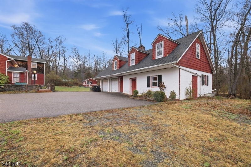 100 Old Croton Road Flemington, NJ 08822 - Photo 27 of 39 a front view of a house with a yard and garage