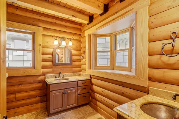 a bathroom with a sink and a bathtub