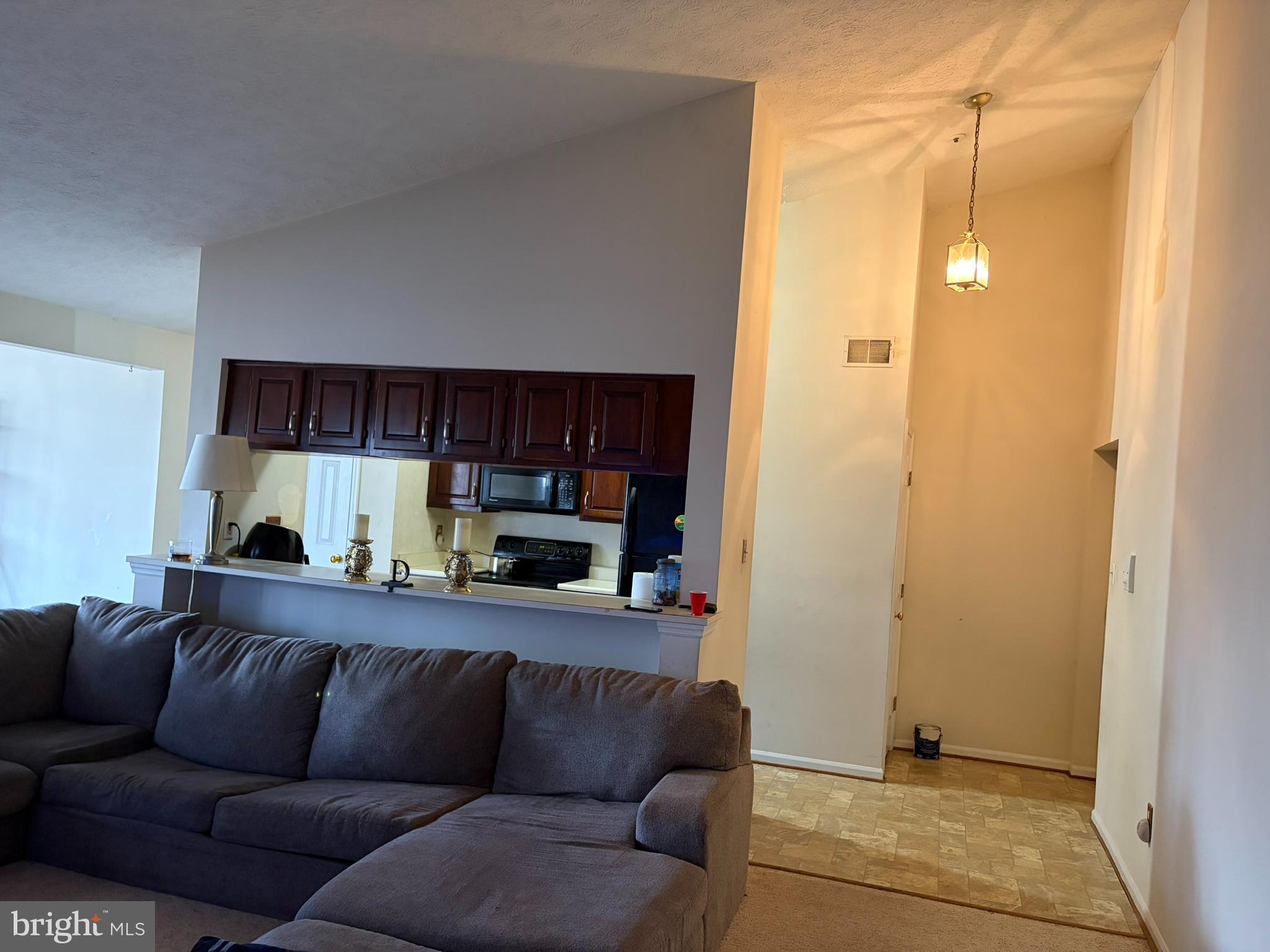 1305 Clover Valley Way, Unit 1305 Edgewood, MD 21040 - Photo 14 of 44 a view of living room couch and furniture