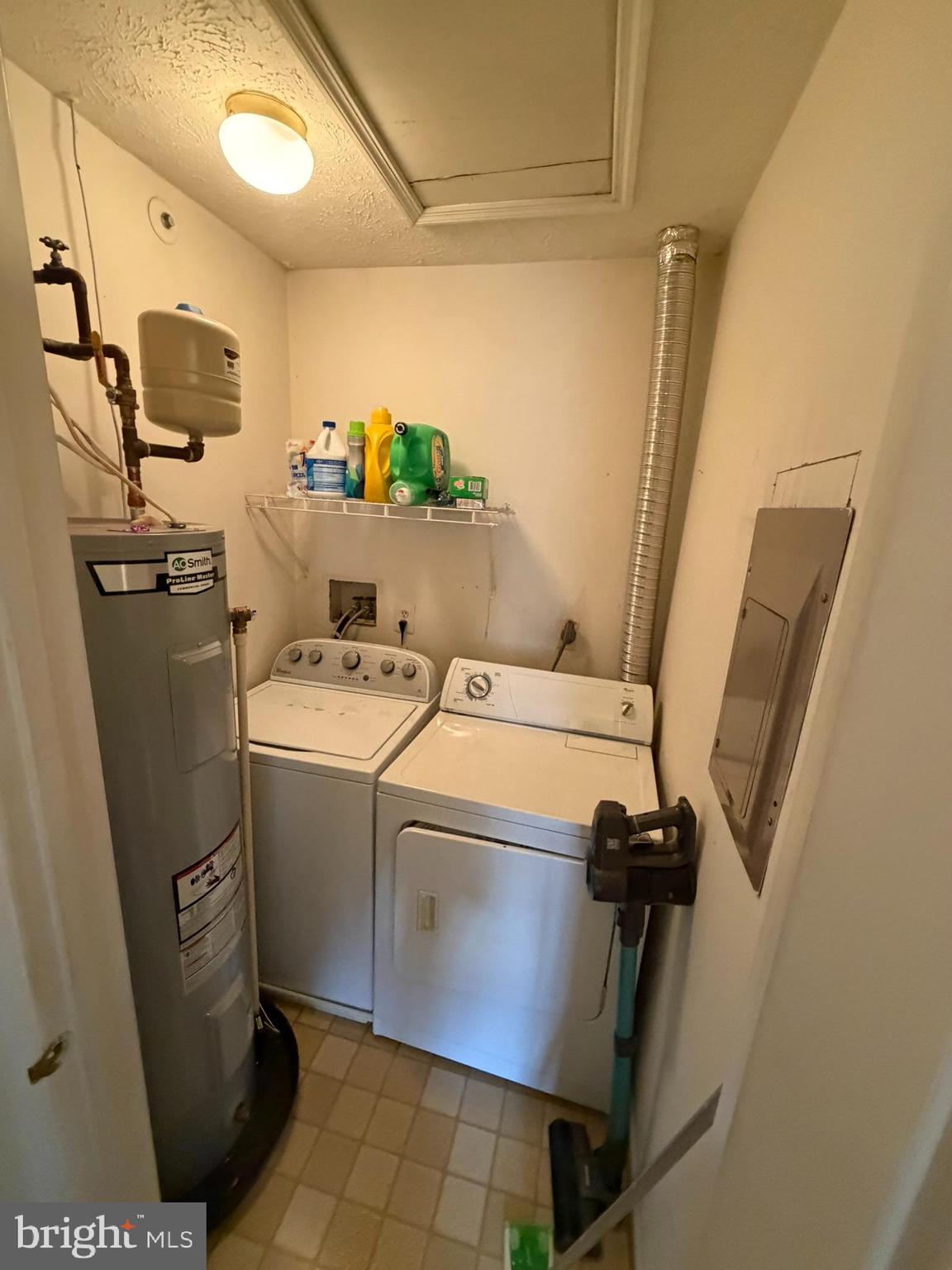 1305 Clover Valley Way, Unit 1305 Edgewood, MD 21040 - Photo 25 of 44 a view of storage and utility room with washer and dryer