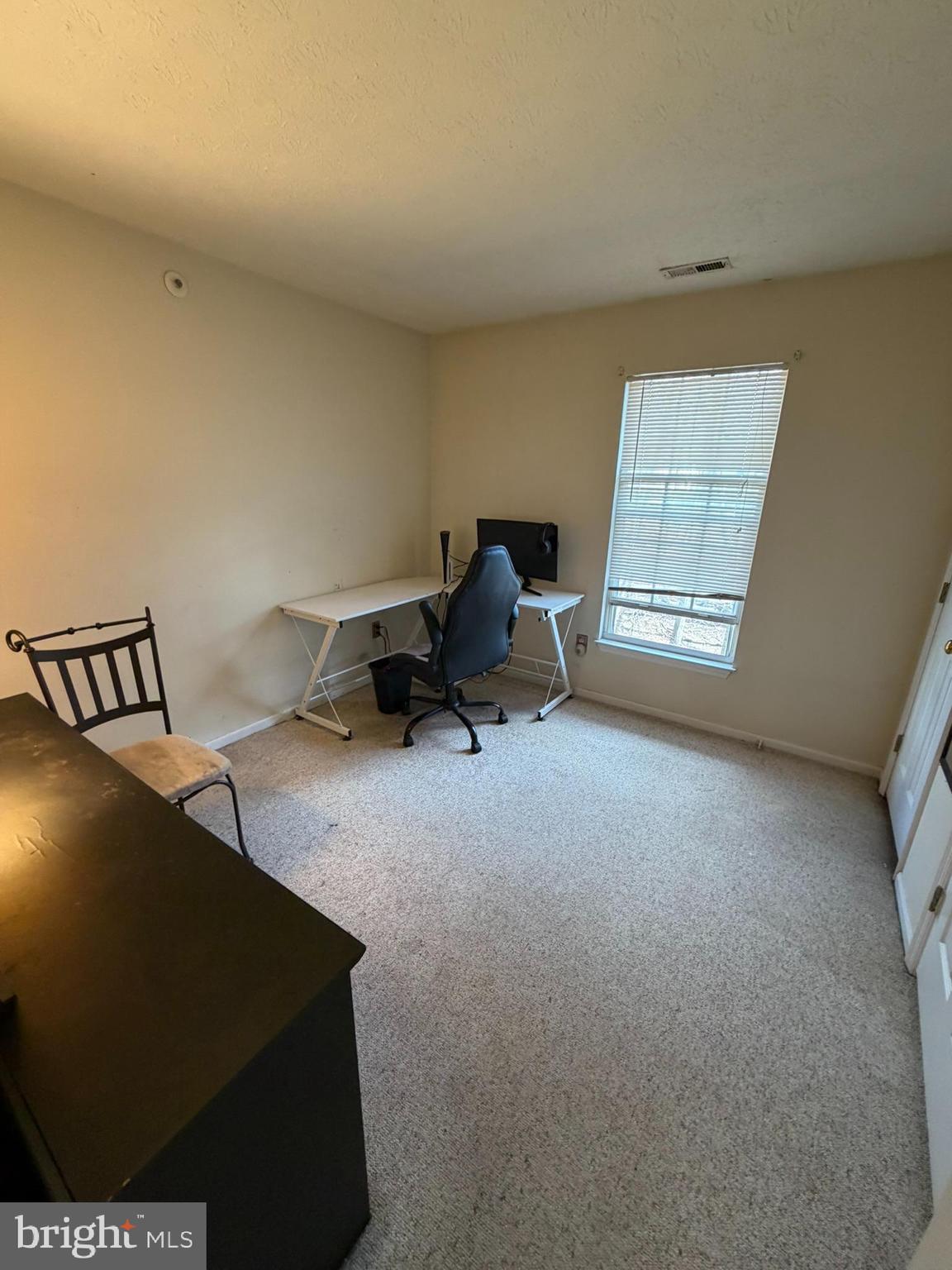 1305 Clover Valley Way, Unit 1305 Edgewood, MD 21040 - Photo 28 of 44 a living room with furniture and a window