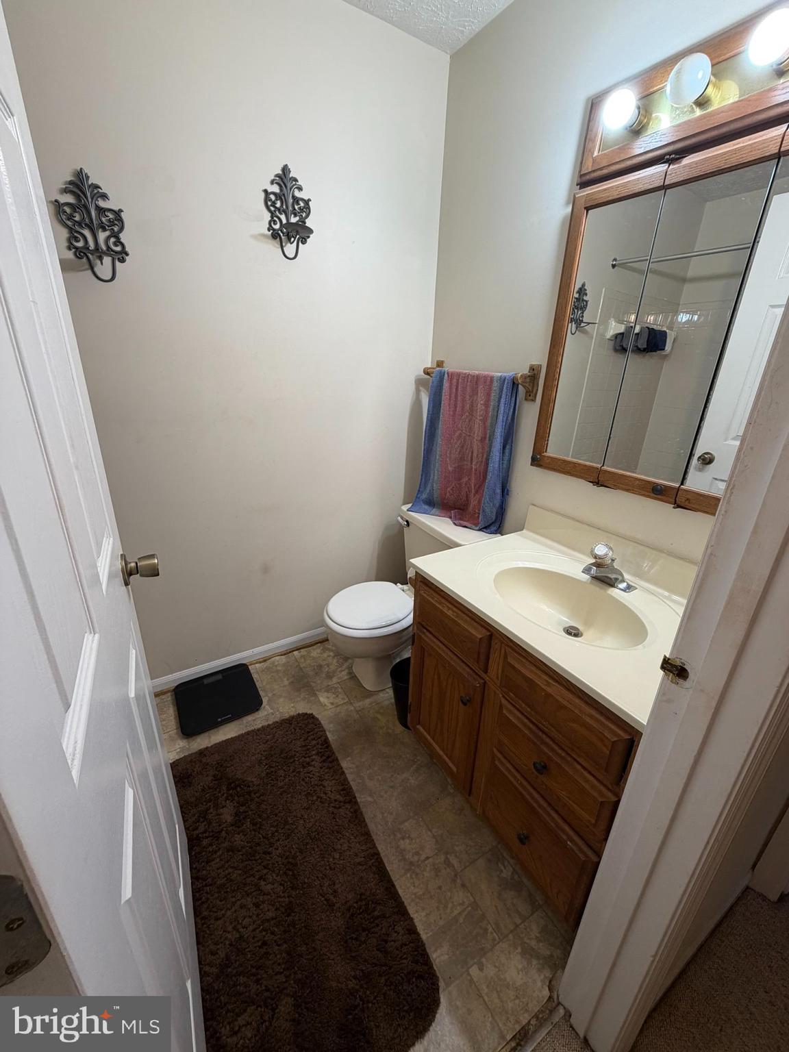 1305 Clover Valley Way, Unit 1305 Edgewood, MD 21040 - Photo 30 of 44 a bathroom with a sink and a mirror