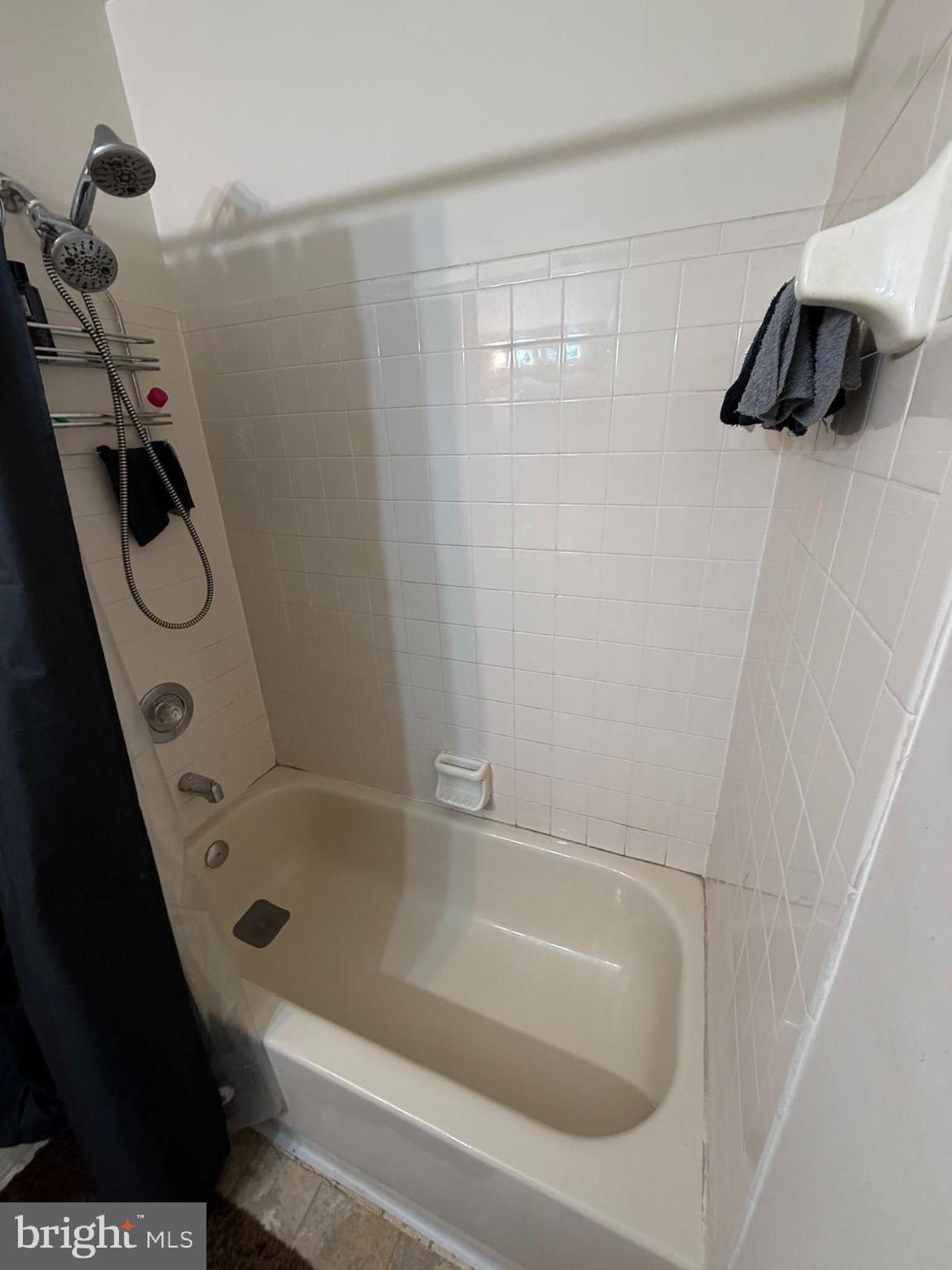 1305 Clover Valley Way, Unit 1305 Edgewood, MD 21040 - Photo 31 of 44 a bathroom with a bathtub