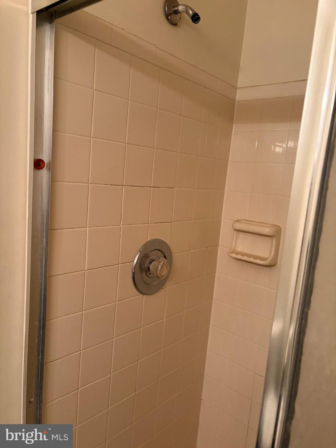 1305 Clover Valley Way, Unit 1305 Edgewood, MD 21040 - Photo 36 of 44 a bathroom with a shower and a sink