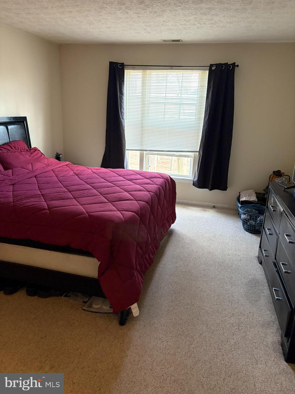 1305 Clover Valley Way, Unit 1305 Edgewood, MD 21040 - Photo 39 of 44 a bedroom with a bed and a large window