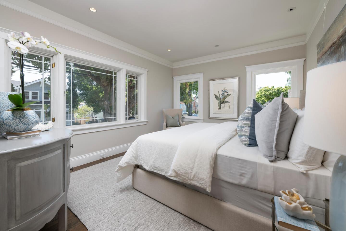 841 Fairfield Road Burlingame, CA 94010 - Photo 15 of 25 a bedroom with a large bed and a window