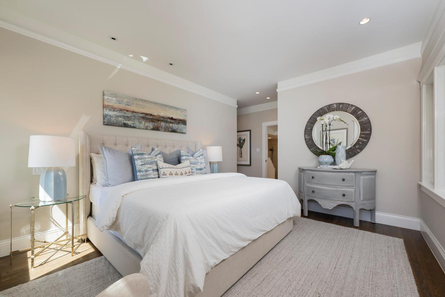 841 Fairfield Road Burlingame, CA 94010 - Photo 16 of 25 a bedroom with a bed and a lamp on table