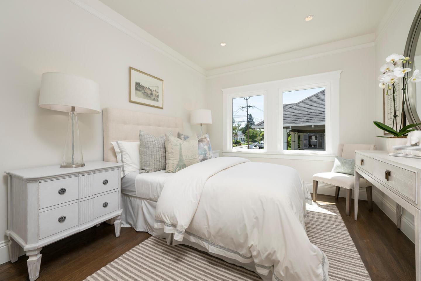 841 Fairfield Road Burlingame, CA 94010 - Photo 18 of 25 a bedroom with a large bed and a window