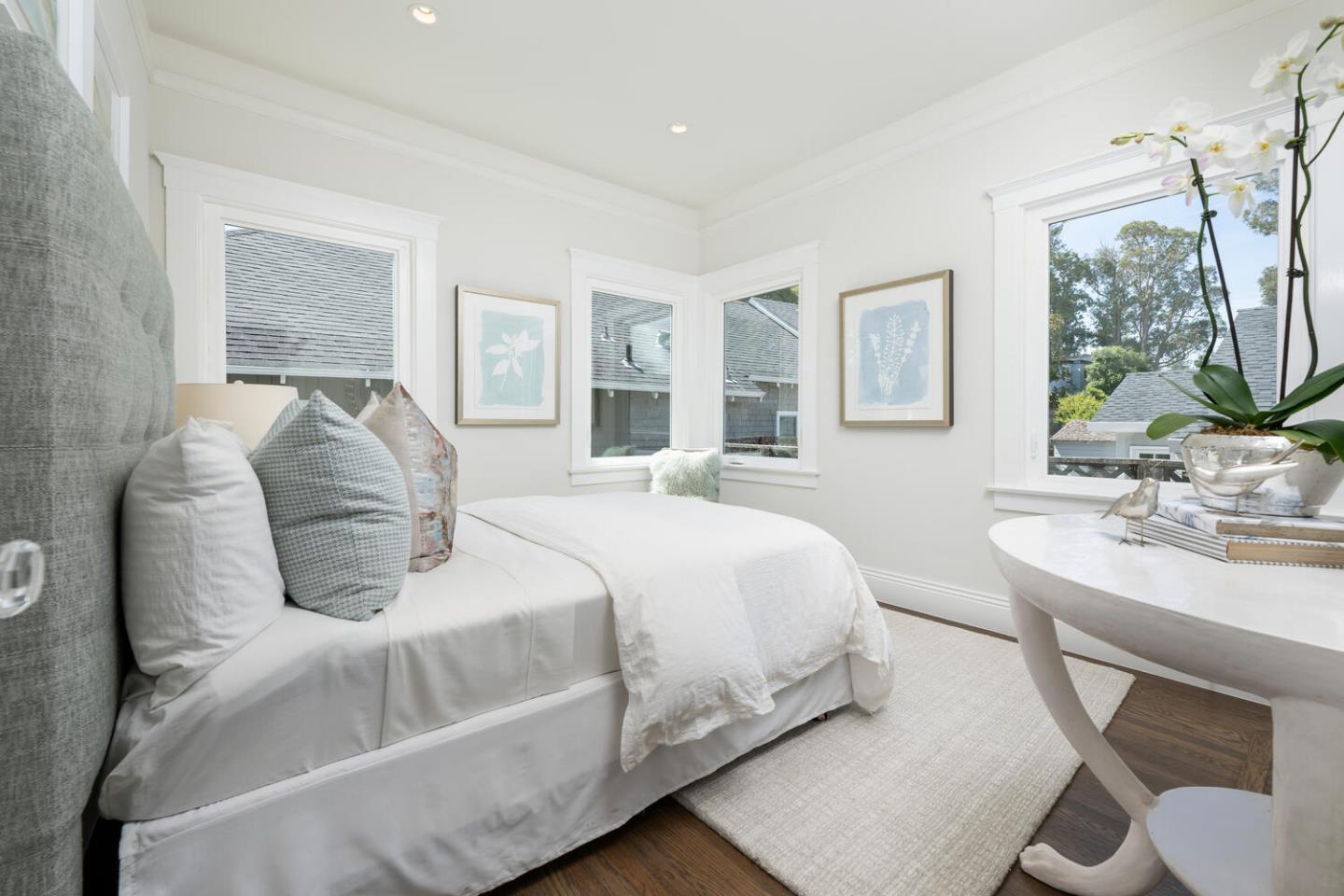 841 Fairfield Road Burlingame, CA 94010 - Photo 19 of 25 a bedroom with a bed and a mirror