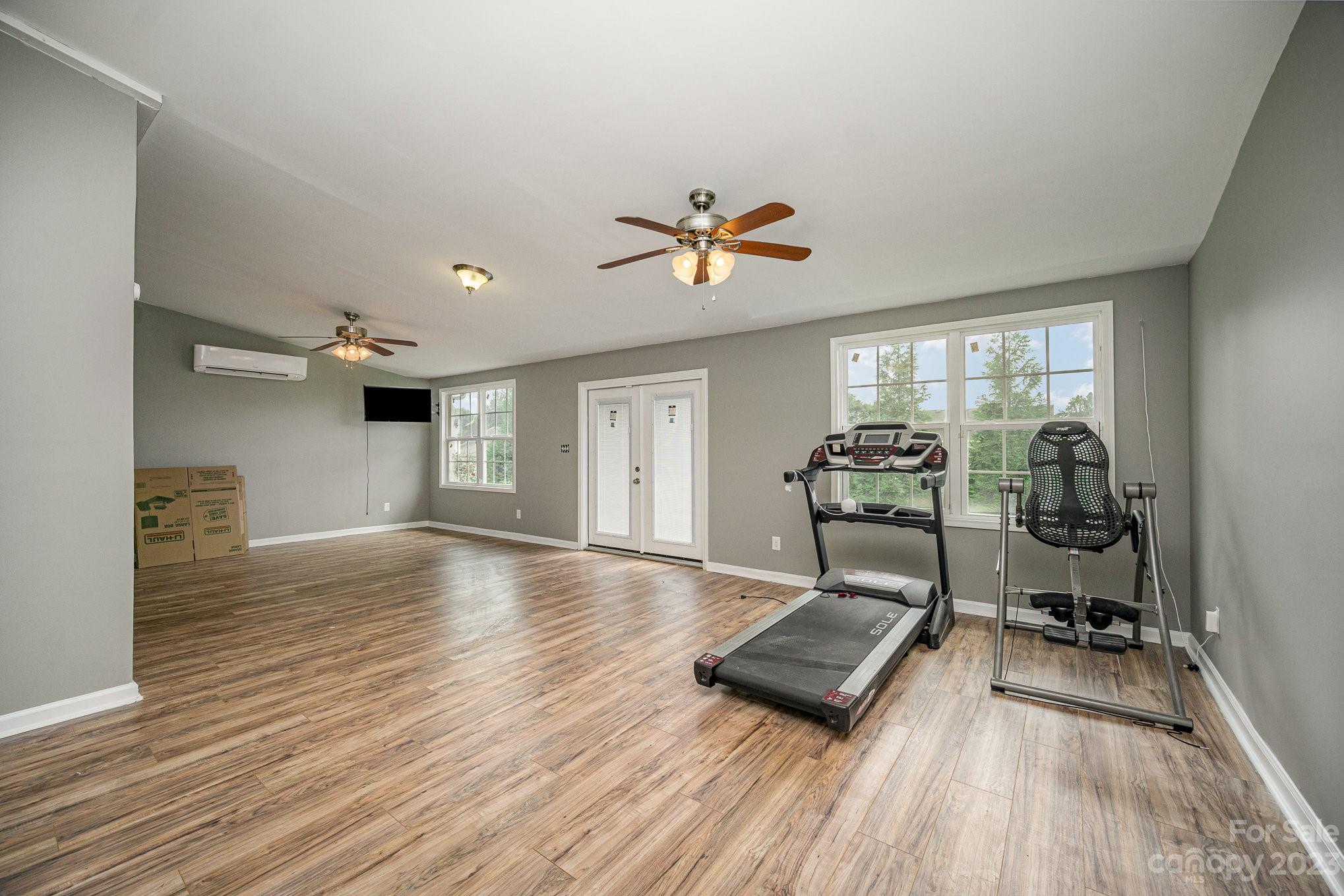 175 Old Carriage Road Clover, SC 29710 - Photo 14 of 34 a living room with furniture and a wooden floor