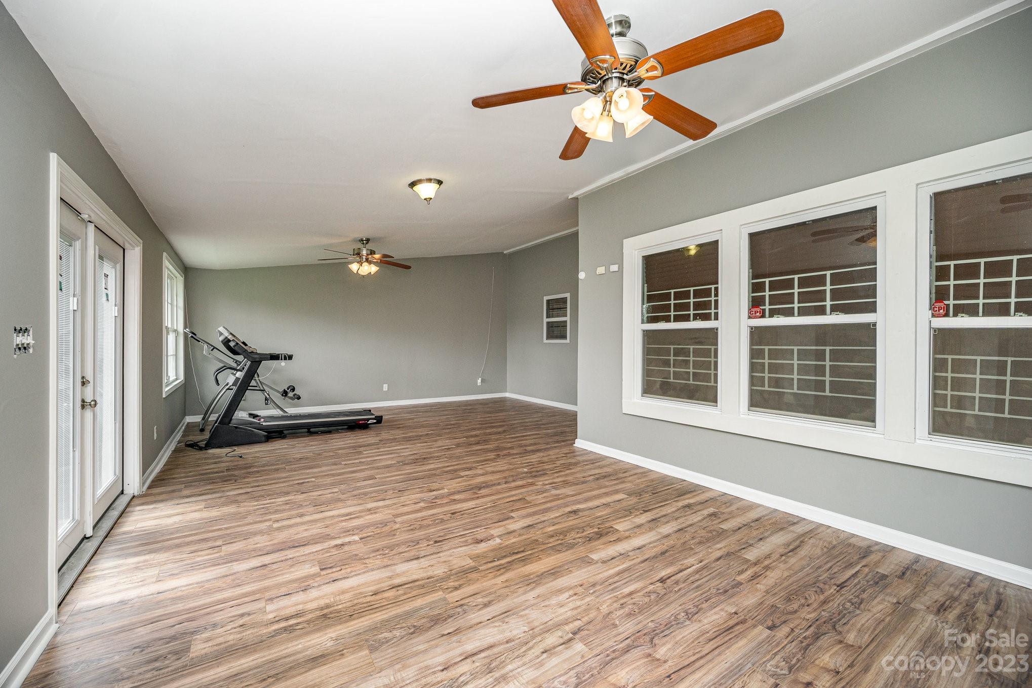 175 Old Carriage Road Clover, SC 29710 - Photo 15 of 34 a view of a livingroom with a ceiling fan and window