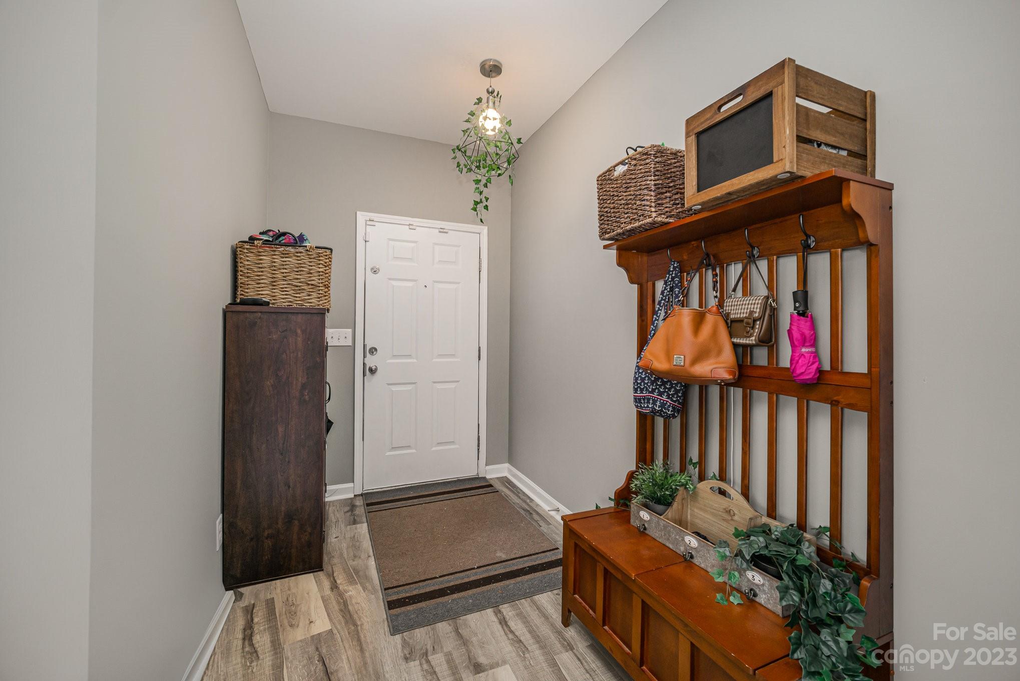 175 Old Carriage Road Clover, SC 29710 - Photo 17 of 34 a living room with furniture and a baby crib