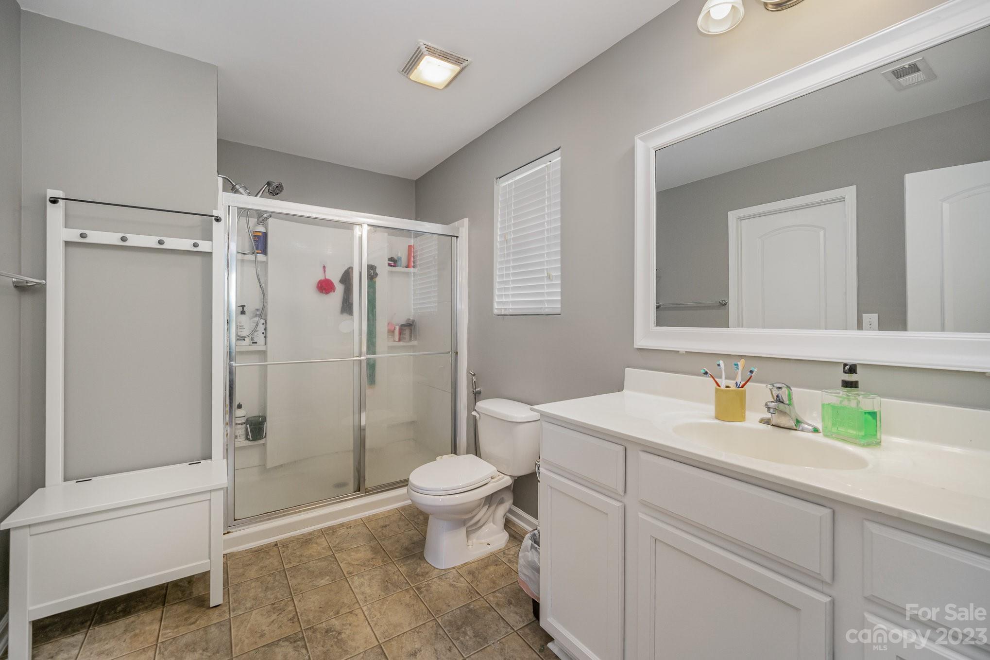 175 Old Carriage Road Clover, SC 29710 - Photo 23 of 34 a bathroom with a sink toilet and shower
