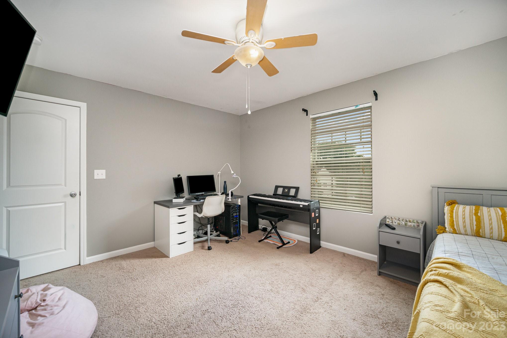 175 Old Carriage Road Clover, SC 29710 - Photo 29 of 34 a livingroom with workspace and a window