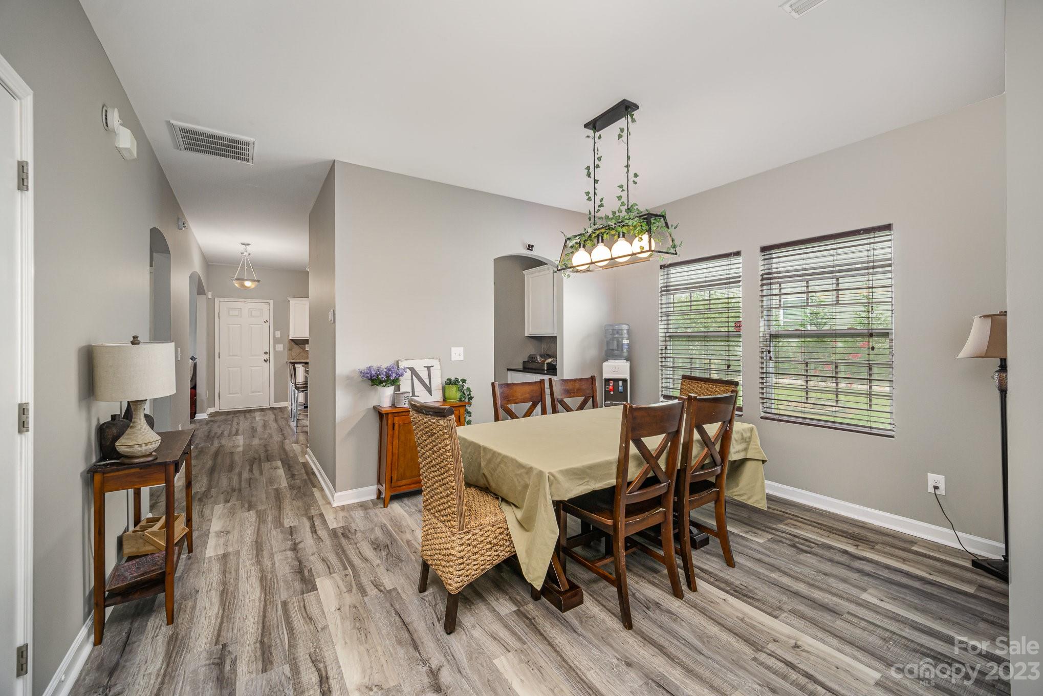 175 Old Carriage Road Clover, SC 29710 - Photo 3 of 34 a view of a dining room with furniture window and wooden floor