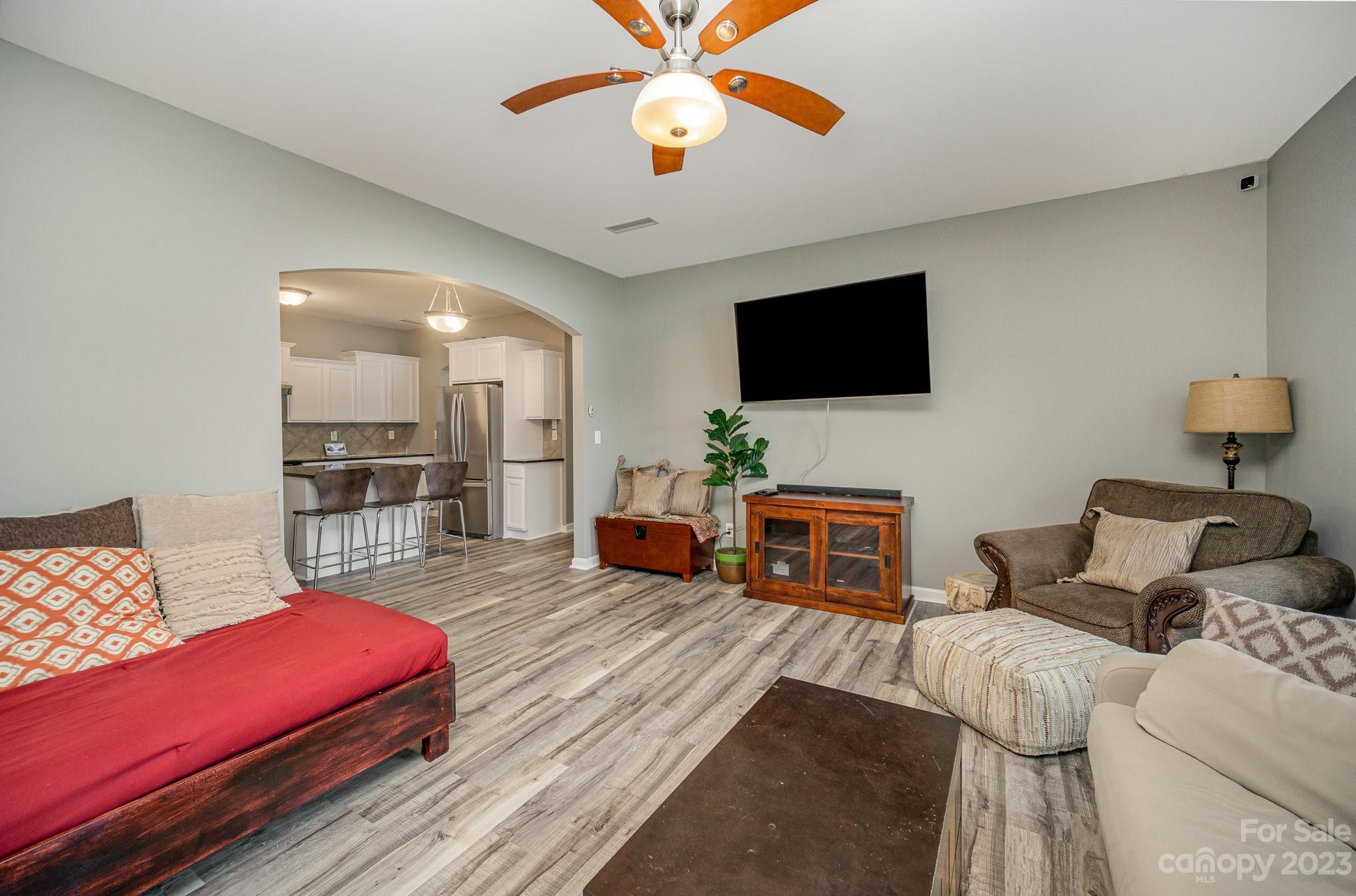 175 Old Carriage Road Clover, SC 29710 - Photo 8 of 34 a living room with furniture and a flat screen tv