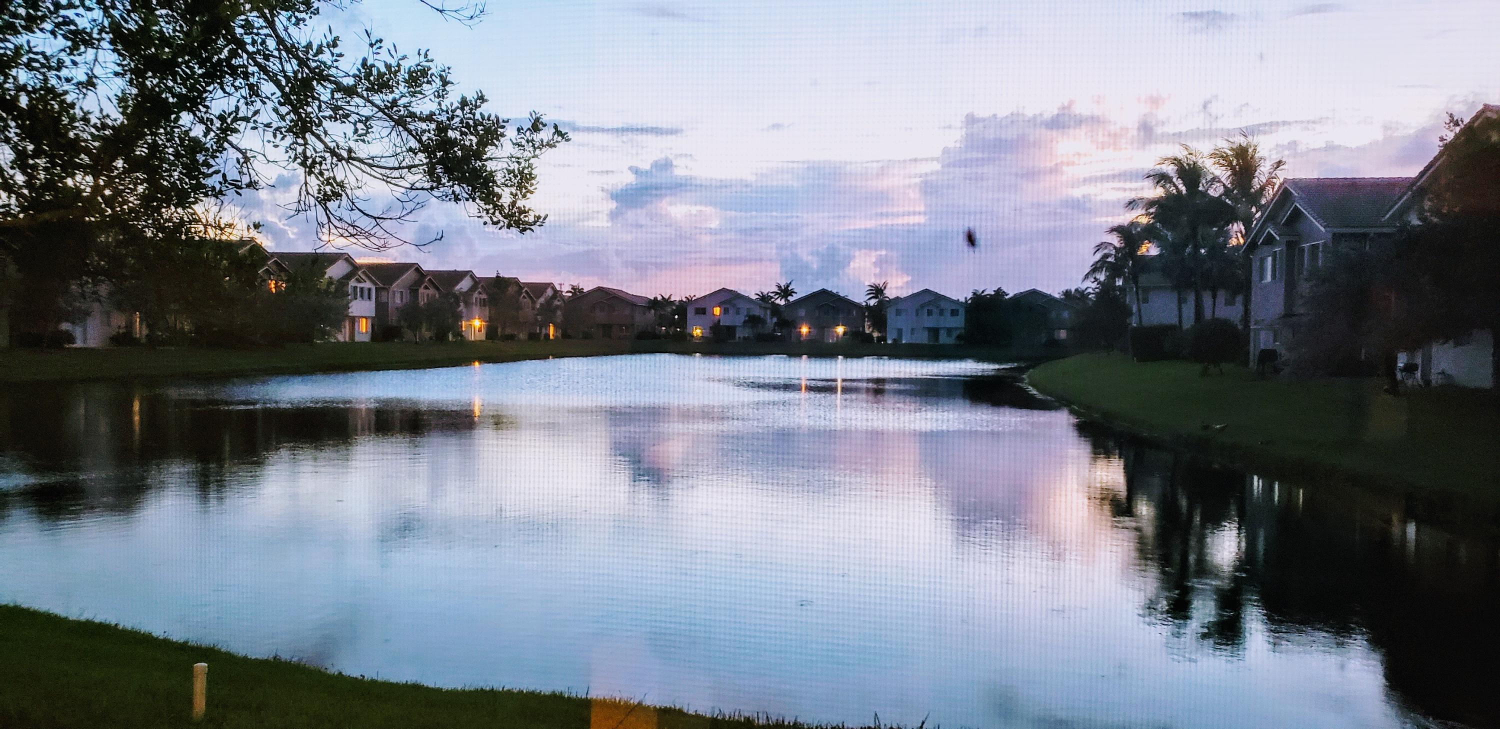 3222 Laurel Ridge Circle Riviera Beach, FL 33404 - Photo 12 of 30 LAKE VIEW FROM MASTER BEDROOM