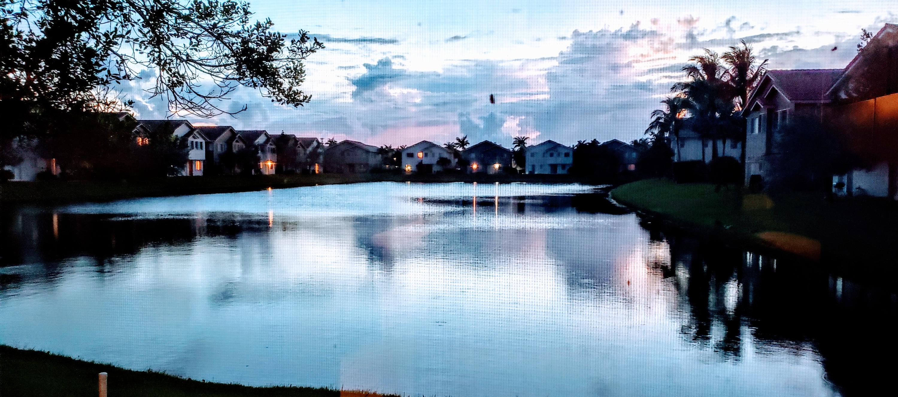 3222 Laurel Ridge Circle Riviera Beach, FL 33404 - Photo 4 of 30 WATCH THE SUNSET FROM ALL LIVING AREAS