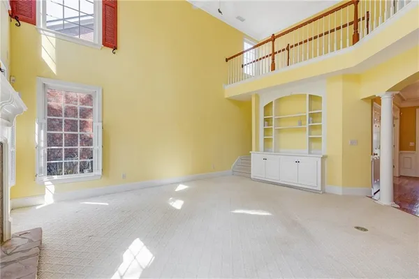 a view of a hallway with staircase