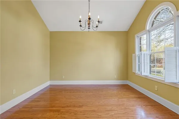 a view of kitchen with furniture and a fireplace