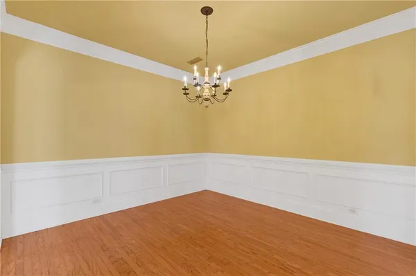 a view of a house with a tree