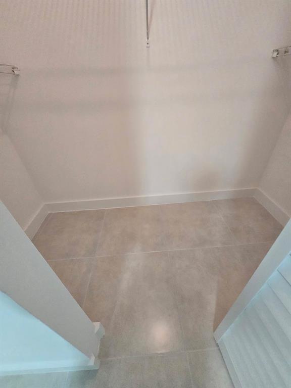 8657 Southwest 5th Street, Unit 201 Pembroke Pines, FL 33025 - Photo 11 of 15 a view of an empty room