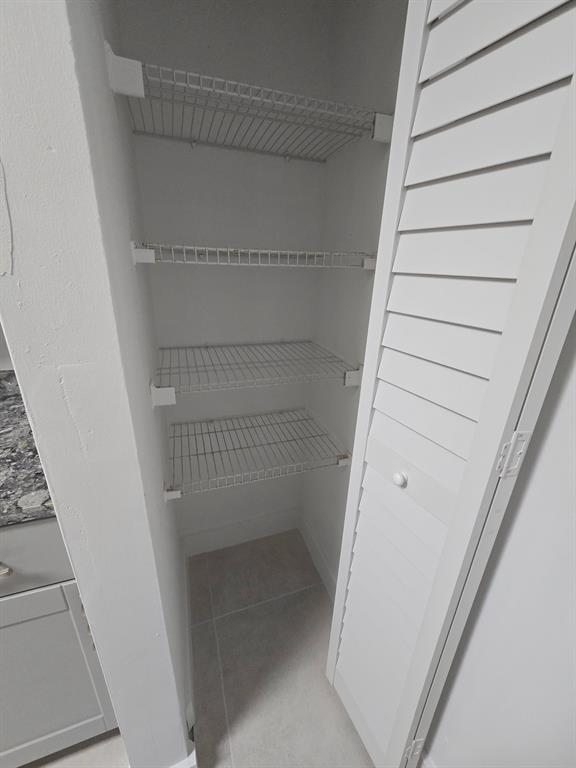 8657 Southwest 5th Street, Unit 201 Pembroke Pines, FL 33025 - Photo 14 of 15 a view of walk in closet