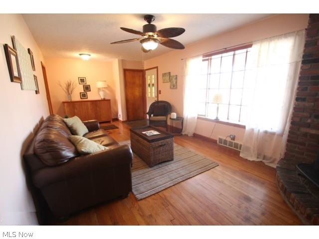 5 Prentice Road Painesville, OH 44077 - Photo 4 of 16 THE GLEAMING HARDWOOD FLOORS ADD TO THE WARMTH OF THIS CHARMING HOME. THERE IS NO "HEMMED IN" FEELING IN THE LARGE LIVING ROOM. THERE IS A GAS WELL ON THE PROPERTY THAT PROVIDES NO COST HEATING. THERE IS ALSO NATURAL GAS INTO HE HOUSE.