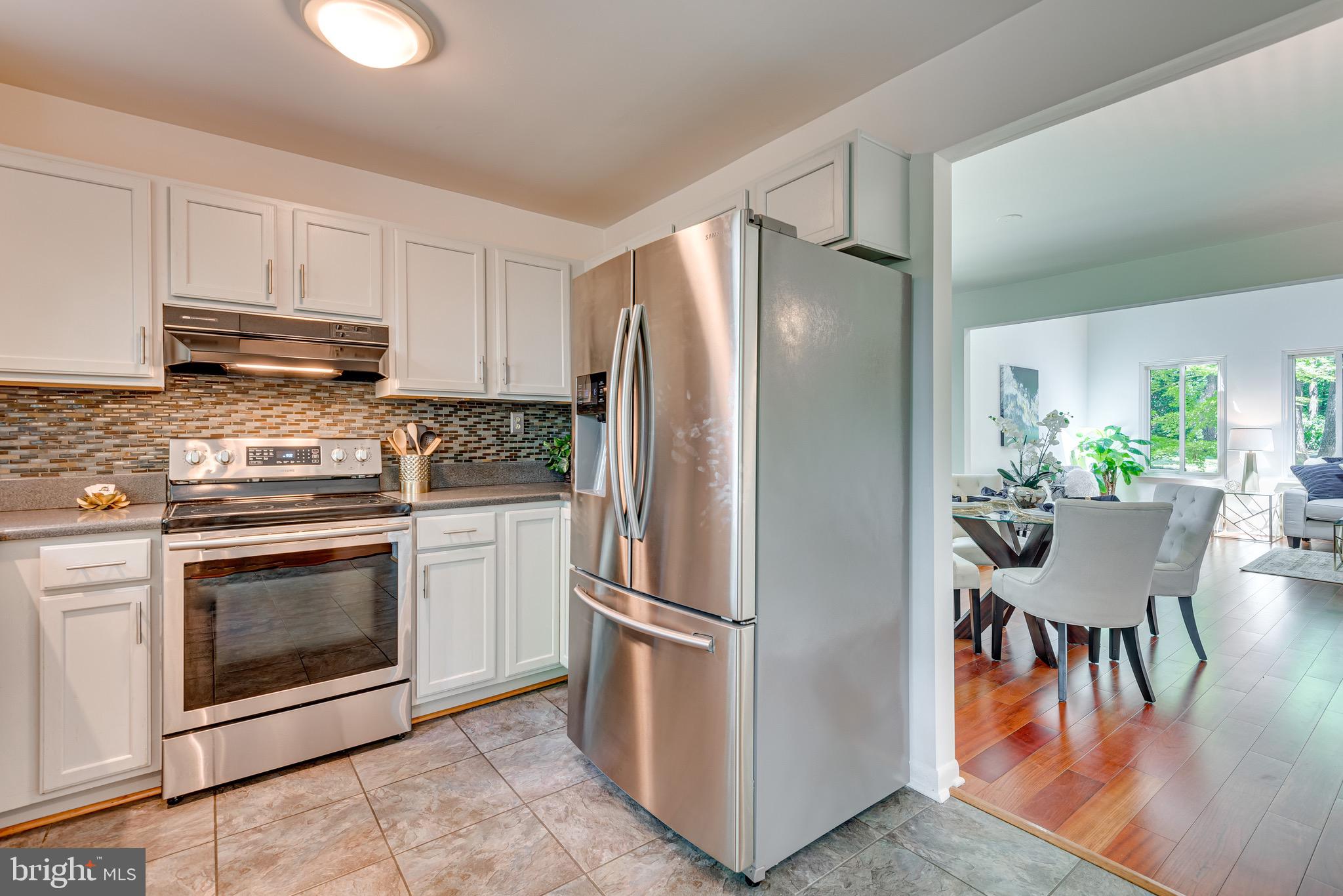 Nice white kitchen with open plan
