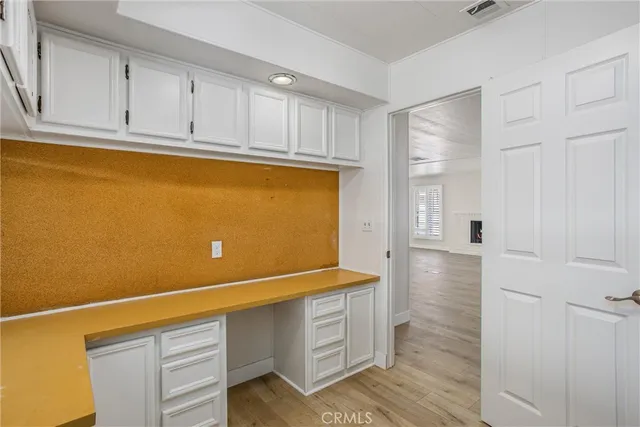 a view of kitchen with wooden floor