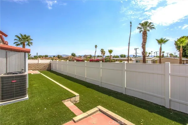a front view of a house with yard