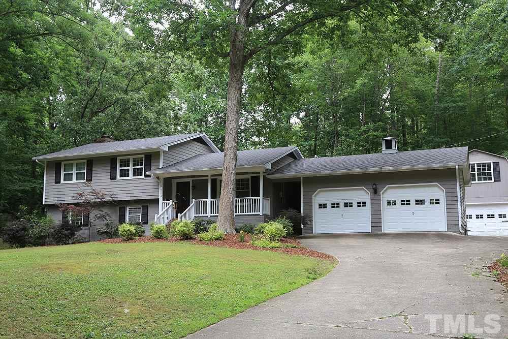 6004 Spring Valley Drive Raleigh, NC 27616 - Photo 1 of 25 What a serene setting, with 2 car garage attached to house and a separate one car with room above.