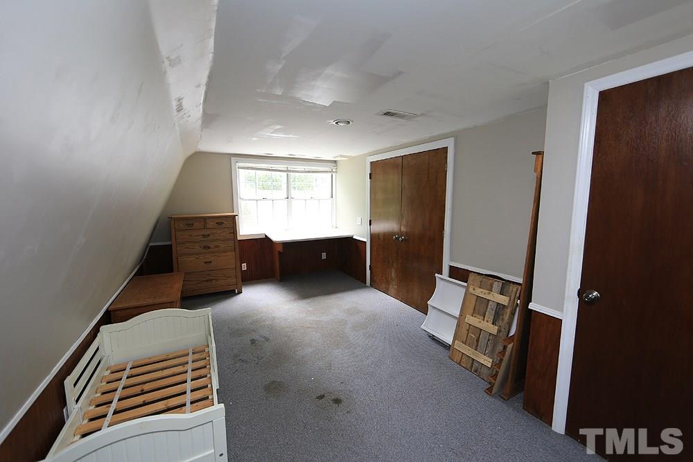 6004 Spring Valley Drive Raleigh, NC 27616 - Photo 17 of 25 This room is NOT fancy, but great for storage, or make it a workout, hobby area.