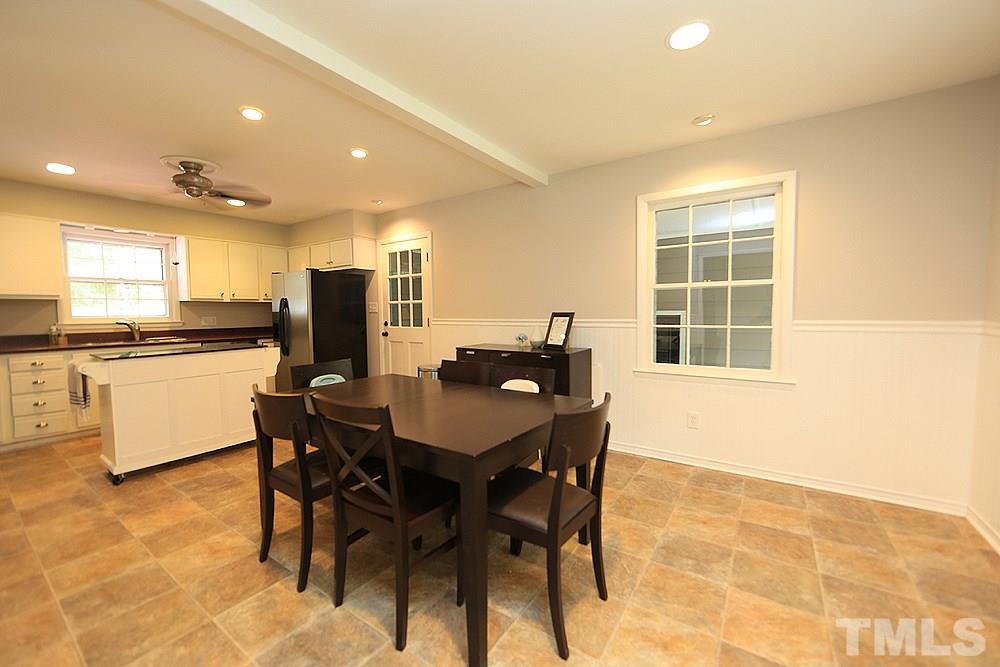 6004 Spring Valley Drive Raleigh, NC 27616 - Photo 5 of 25 This area is generous in size and great for talking with the cook, or doing homework nearby the cook.