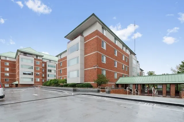 a view of a building with a street