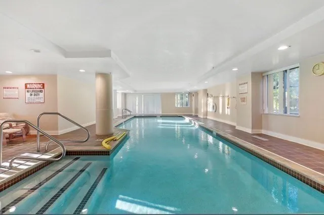 a view of a living room and dining room