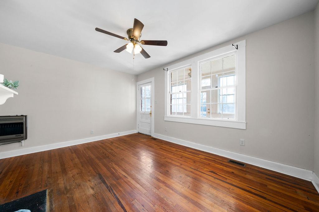 14 Green Street Northeast Rome, GA 30161 - Photo 14 of 24 a view of empty room with wooden floor and fan