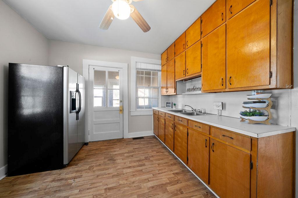 14 Green Street Northeast Rome, GA 30161 - Photo 15 of 24 a kitchen with stainless steel appliances granite countertop a refrigerator and a sink