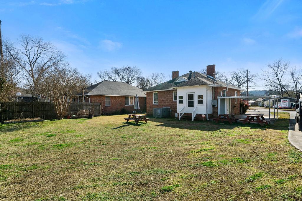 14 Green Street Northeast Rome, GA 30161 - Photo 23 of 24 a view of a house with a yard