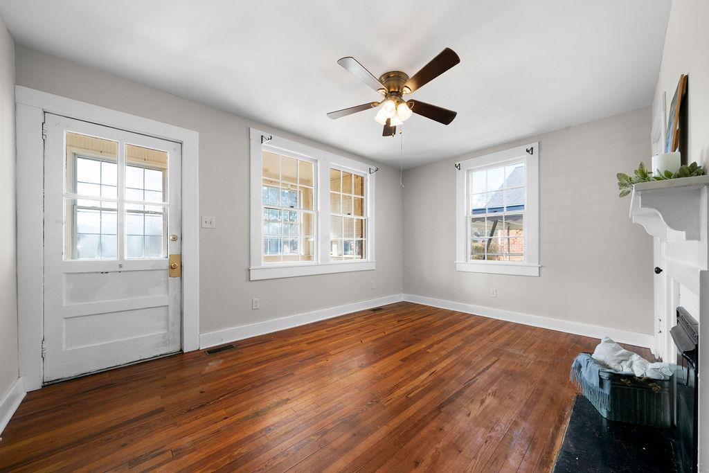 14 Green Street Northeast Rome, GA 30161 - Photo 9 of 24 a view of empty room with wooden floor and fan