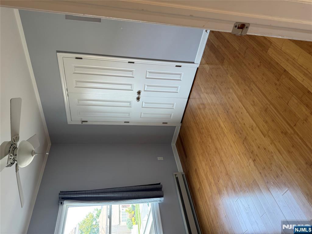 205 Valley Brook Avenue, Unit 2 Lyndhurst, NJ 07071 - Photo 4 of 5 a view of an empty room with a window