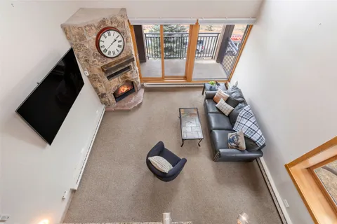 a view of living room with furniture and a flat screen tv
