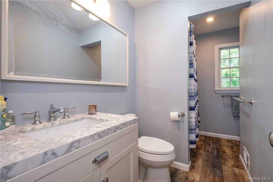 393 Milton Road Rye, NY 10580 - Photo 11 of 22 Hall bath with marble countertop.