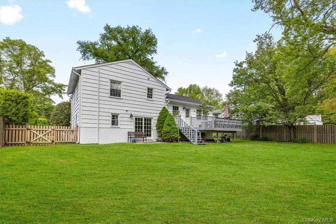 393 Milton Road Rye, NY 10580 - Photo 15 of 22 Oversized deck off the kitchen- perfect for evening dinners, morning coffee in the privacy of your own back yard.
