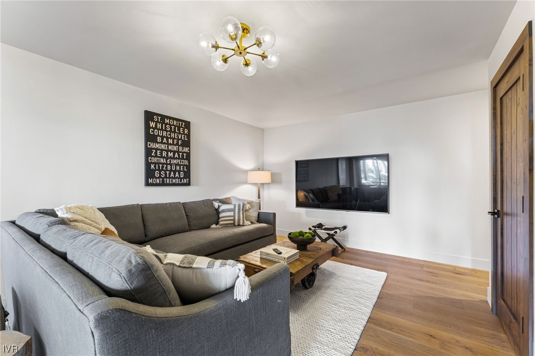 859 Tyner Way Incline Village, NV 89451 - Photo 19 of 33 a living room with furniture and a flat screen tv