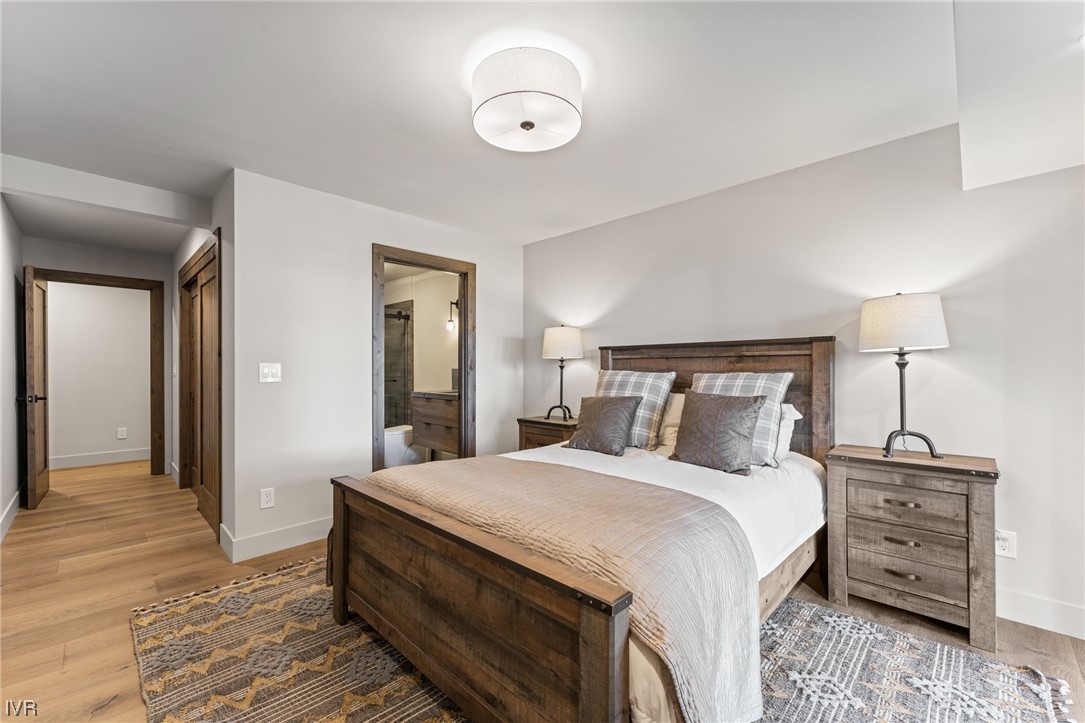 859 Tyner Way Incline Village, NV 89451 - Photo 21 of 33 a bedroom with a bed and a night stand