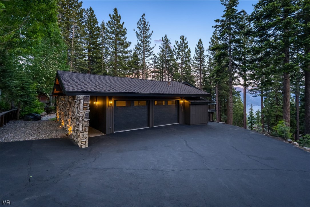 859 Tyner Way Incline Village, NV 89451 - Photo 30 of 33 a view of a house with a yard and garage